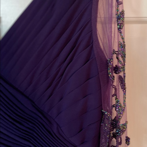 Gorgeous A-line dress with hand-beaded elbow length, illusion sleeves. - Picture 8 of 9